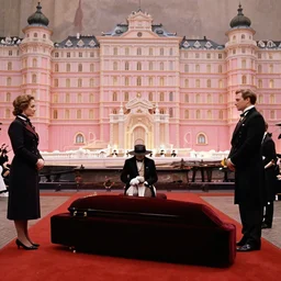 a film still of a funeral in the grand budapest hotel ( 2 0 1 4 )