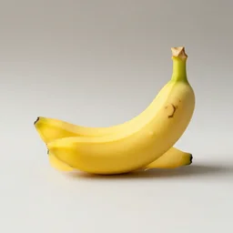 a ( perfume bottle ) x that looks like a banana