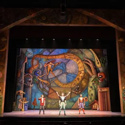 photo of a huge theaterstage, play is charlotte's web, 3 actors on stage, 8 k, multicolored, exaggerated detailed, long shot