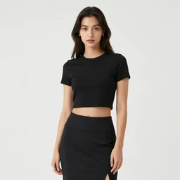 portrait of a woman wearing a black crop top and a skirt