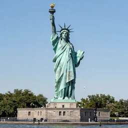 Colossal neoclassical copper sculpture of a Katniss Everdeen, holding a torch, green patina, on Liberty Island, New York Harbour