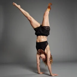 natalie dormer with tattoos wearing miniskirt and fox - tail doing a handstand, sweaty, full - body