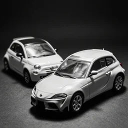 Toyota supra and fiat 500 combined, toy car, pro photography, b&w dramatic