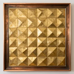 a wall made of geometric gold pieces bordered by a copper tinted mirror