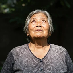 an old fat woman looking up at the sun