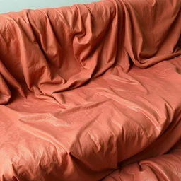 a soft, slimy couch cover with human skin, big seams showing