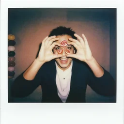 color Polaroid of candy man smiling while staring through your soul in candy land ,creepy pasta
