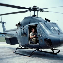 film still, helicopter extreme far view, emma watson vietnam door gunner, film still from apocalypse now ( 1 9 7 9 ), 2 6 mm, kodak ektachrome, blue tint expired film,