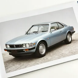1 page from 1 9 9 0 s car photograph magazine.