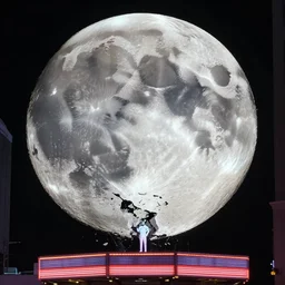 film still of the moon shattering into pieces over time square in the new sci - fi movie, 8 k, night time