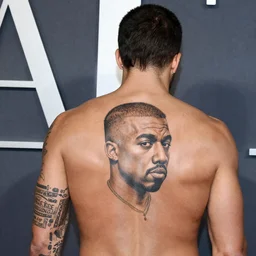 pete Davidson with a full back tattoo of Kanye west