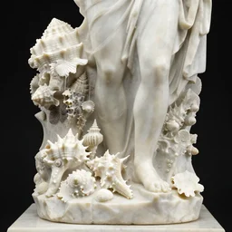 a beautifully carved marble statue of a many seashells and corals