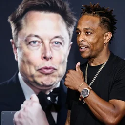 photograph of lil uzi vert dapping up Elon musk