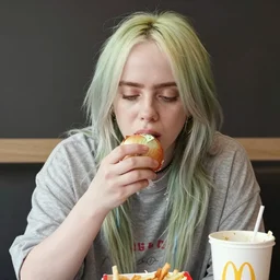 paparazzi photo of Billie Eilish eating an onion in Lewisham McDonalds