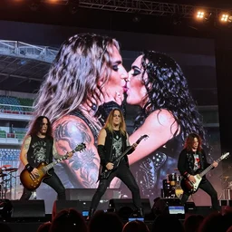 legendary kiss metal band reunion concert on a stadium. detailed photo at the stage. 3 5 mm trending