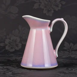 geodesic triangle ceramic pitcher with pink and purple iridescent glaze, dark floral wallpaper background