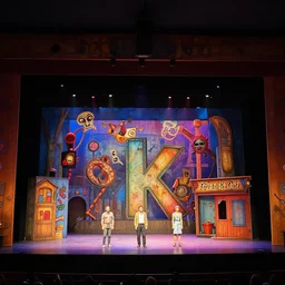 photo of a huge theaterstage, play is fritz the cat, 3 actors on stage, 8 k, multicolored, exaggerated detailed, long shot