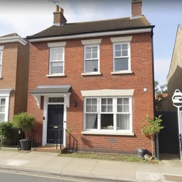 a picture of a brick house, found on google street view