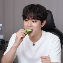 hachubby, korean streamer on twitch eating a cucumber, photography
