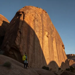 tourist photo next to the world's biggest rock