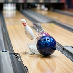 bowling ball pin being smashed like glass by a bowling ball,, intense, action shot,, physics