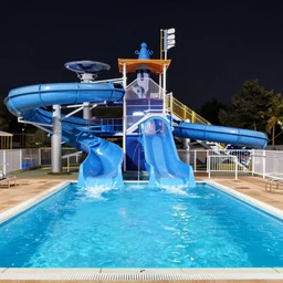 2 0 0 0 s waterpark blue water slide empty pool liminal nighttime dark nikon coolpix 5 1 0 0 no light