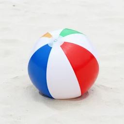 a beachball on a sandy white beach, iPhone HDR image