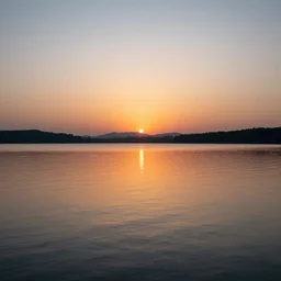 tranquil mesmerizing calm lake at sunset detailed, 8k, mesmerizing, low saturation, high resolution