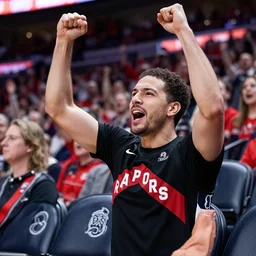 spanish man cheering on the toronto raptors from the stands at scotiabank arena