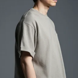 Close upper body shot. Artistically angled subject.  Professional studio portrait lighting. wearable designed by Ikeuchi Hiroto.