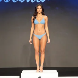 a girl on a podium bikini modelling