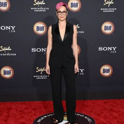 photo of a gorgeous Gal Gadot (1990) pink pixie cut hair hipster glasses by Mario Testino, detailed, full body shot, award winning, Sony a7R