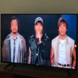 1 9 9 0 s pop music video being viewed on tv screen