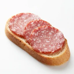 a piece of bread with salami on top