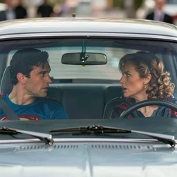 a stunning ultra detailed fine art photo of front view of car's windshield with a superman driver and lois lane passenger arguing inside, by tom bagshaw and artgerm, artstation, 8 k, cinematography by roger deakins and caleb deschanel, deep depth of field, highly coherent, zoom in on the front windshield, action movie