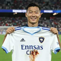 son heung min smiling holding jersey for Kansas City Sporting barbecue sauce stain photo