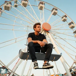 umberto smaila sitting in the panoramic wheel at coney island