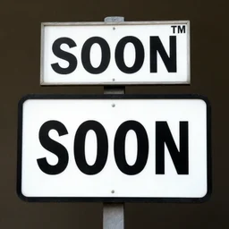 A sign saying SOON and a smaller sign saying TM above it
