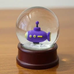 a snowglobe sitting on a wooden table. inside the snowglobe is a purple submarine