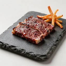 kobe beef and cheetos served on a stone tablet, michelin star restaurant 4K photo