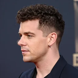 rick astley perm wavy curly fade short haircut with earings
