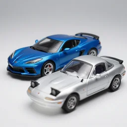 blue 1 9 6 9 corvette and a silver 1 9 9 9 miata. 3 5 mm 8 k