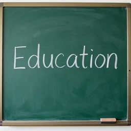 a school chalkboard that has education written on it with white chalk