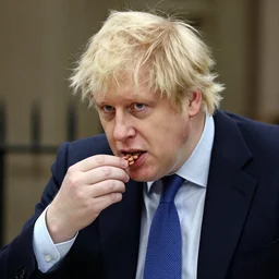 Boris Johnson eating beans