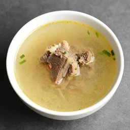 a bowl of soup with meat and vegetables, a stock photo by guan daosheng, trending on shutterstock, shin hanga, playstation 5 screenshot, 8 k, stock photo