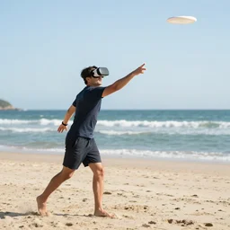 a man wearing a vr headset on the beach while throwing a frisbee