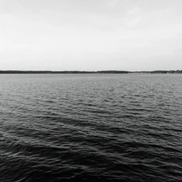 lake with black water above side view, sky horizon