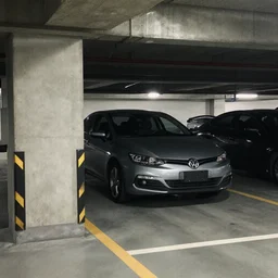 f 1 car in a parking garage in the city