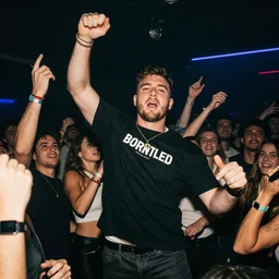 andrew tate throwing it back in a nightclub, bussin