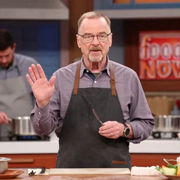 walter white presenting a cooking show in the food network, 4 k, highly detailed, television screencap